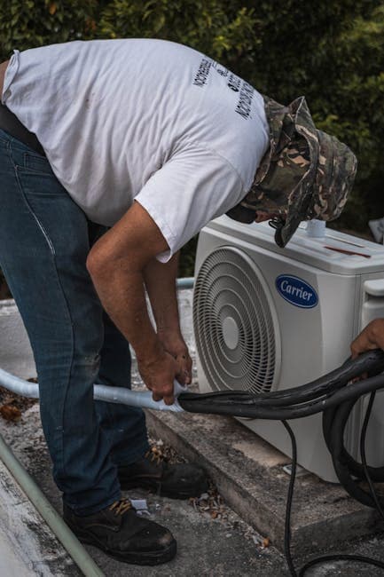 HVAC technician using digital tablet for quoting